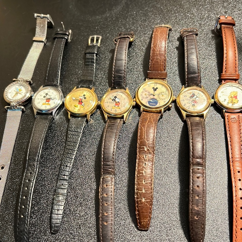 Collection of 7 Disney watches. 4 Mickey, 1 Minnie, 1 Tinkerbell, 1 Pooh bear.